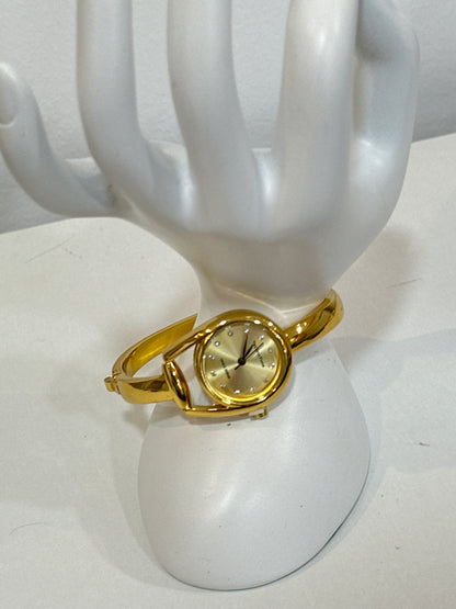 Relógio dourado