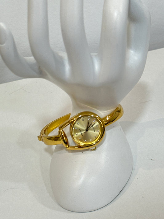 Relógio dourado