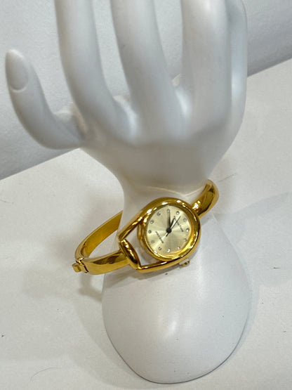 Relógio dourado