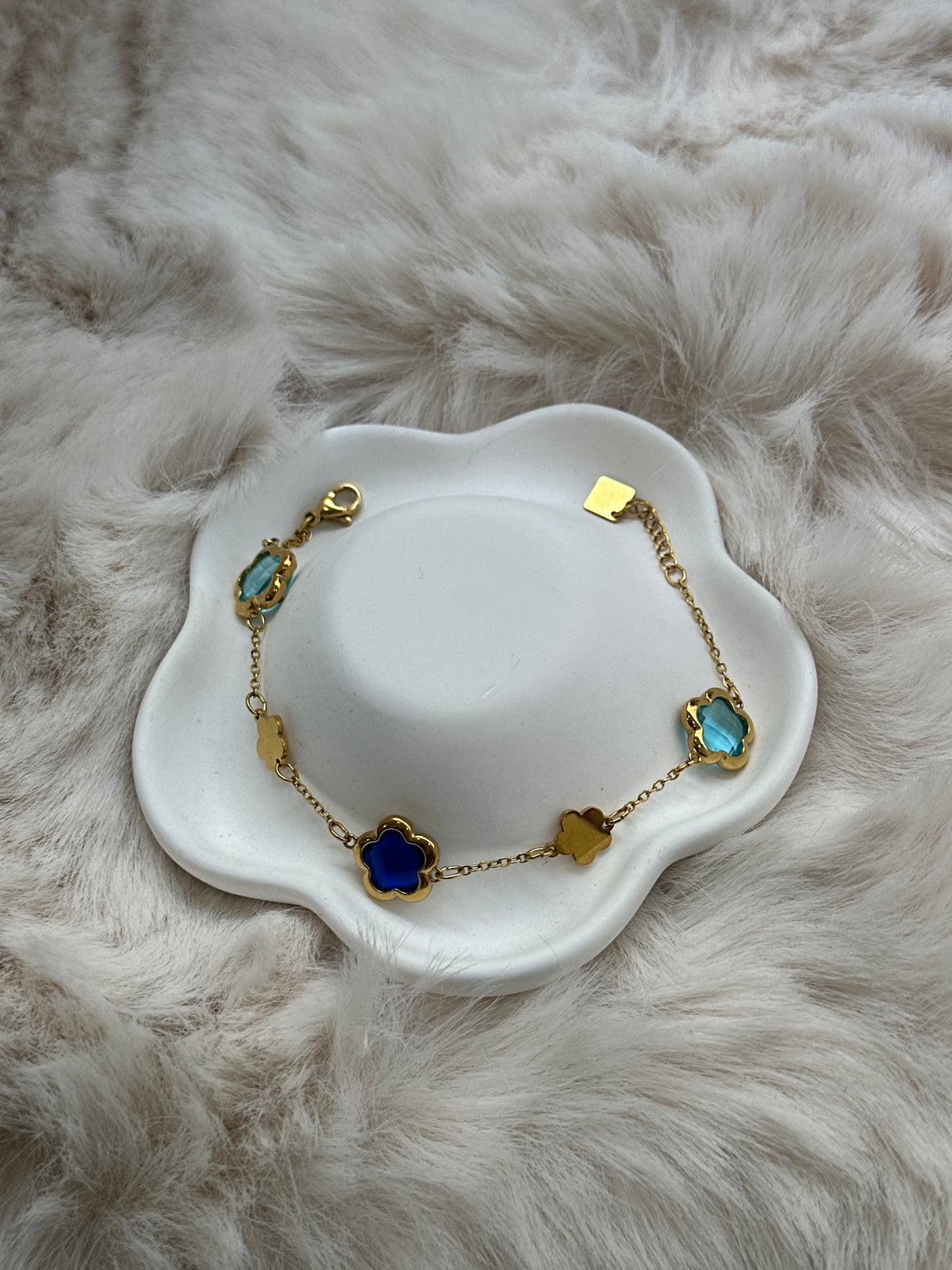 Pulseira flores com pedras azul