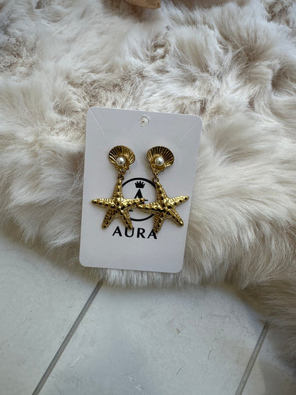 Brinco estrela do mar dourado